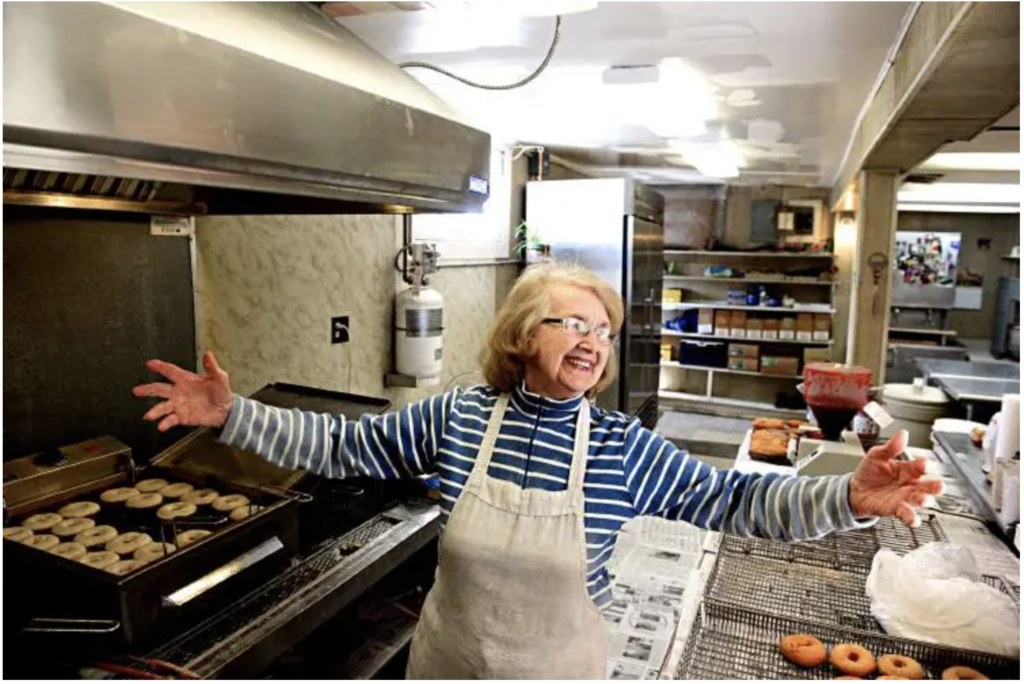 Muriel greeting customers